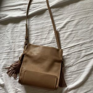 Nude cross body bag.